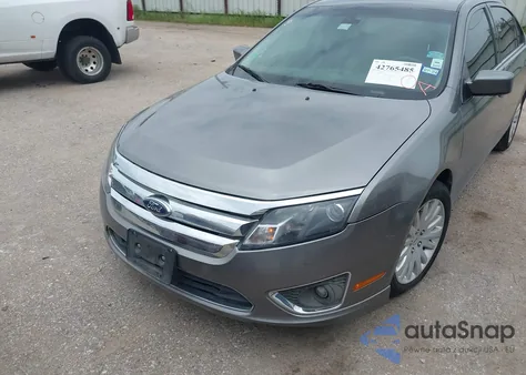 2011 Ford Fusion Hybrid from USA, damaged, VIN 3FADP0L31BR273685